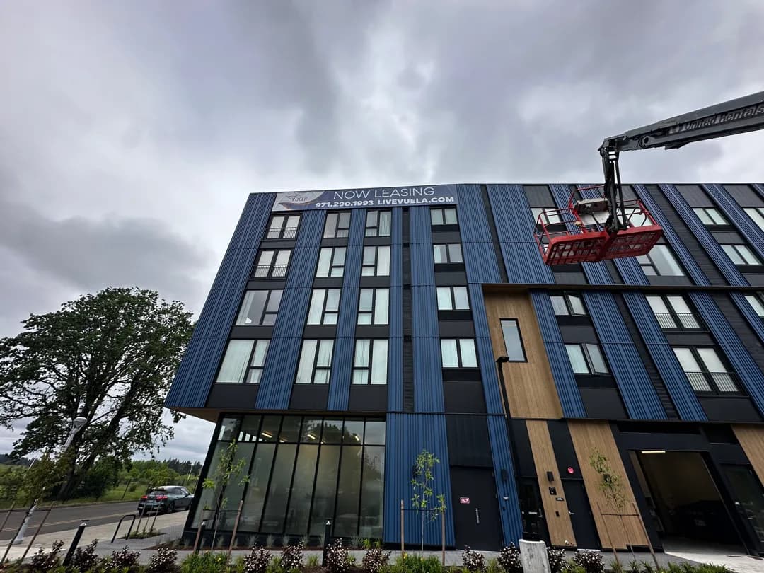 Vuela Apartment Banner installation
