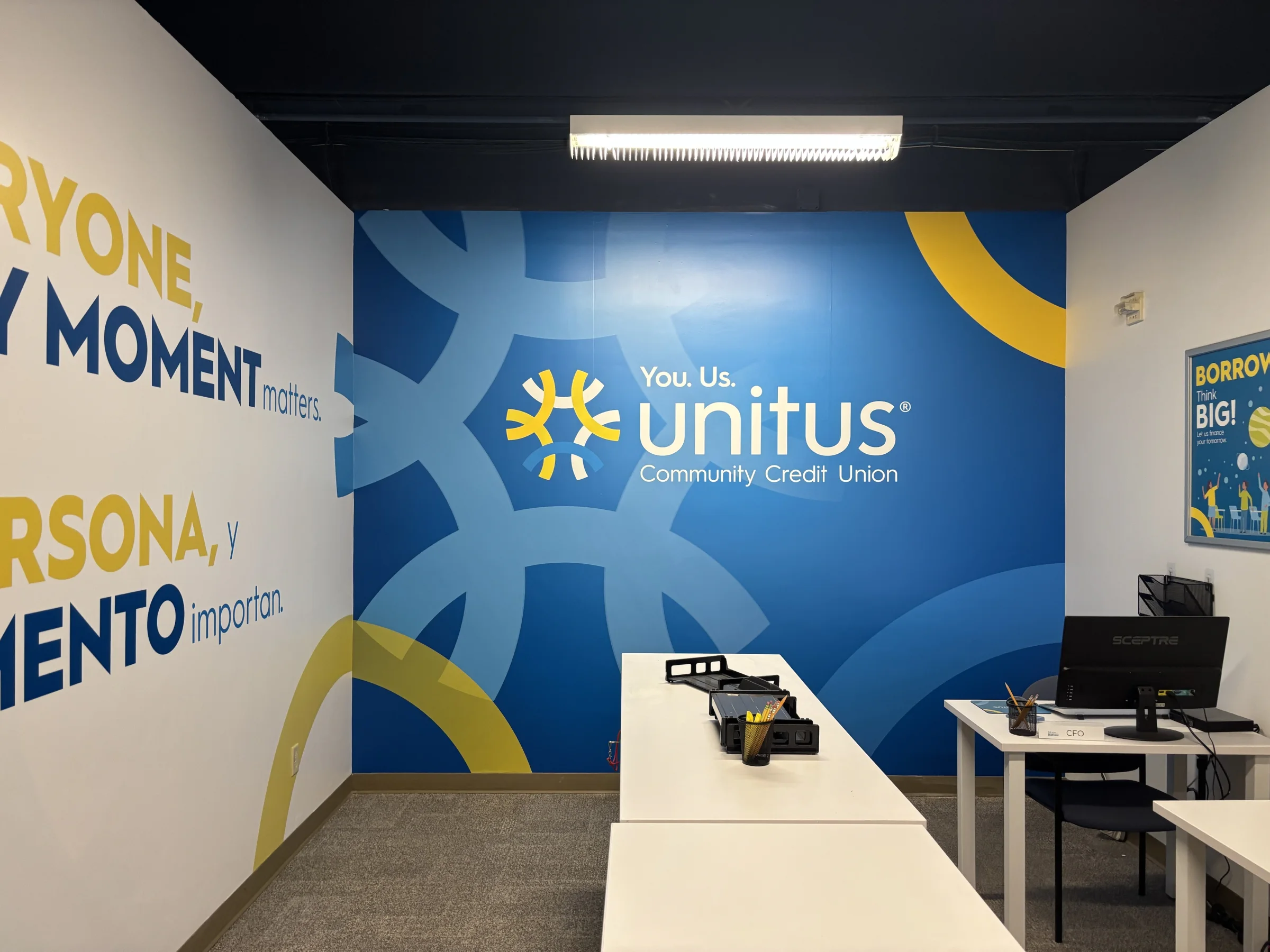 Completed Unitus Community Credit Union feature wall at BizTown PDX