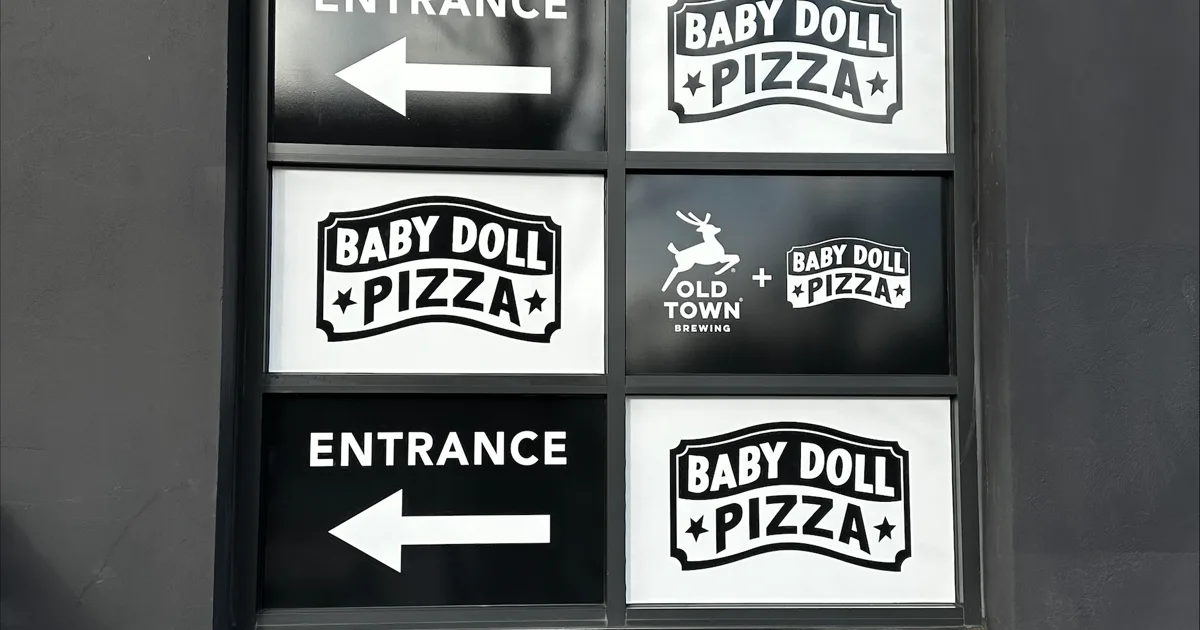 Commercial storefront window graphics for leasing and promotions