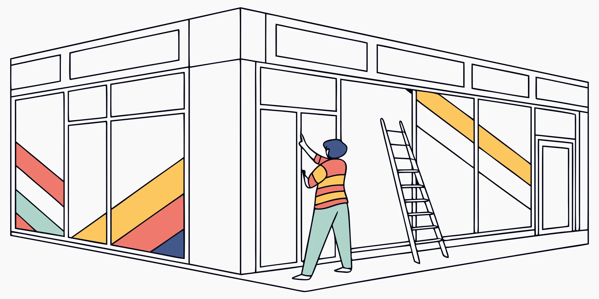 Installer applying coordinated vinyl graphics in a retail store