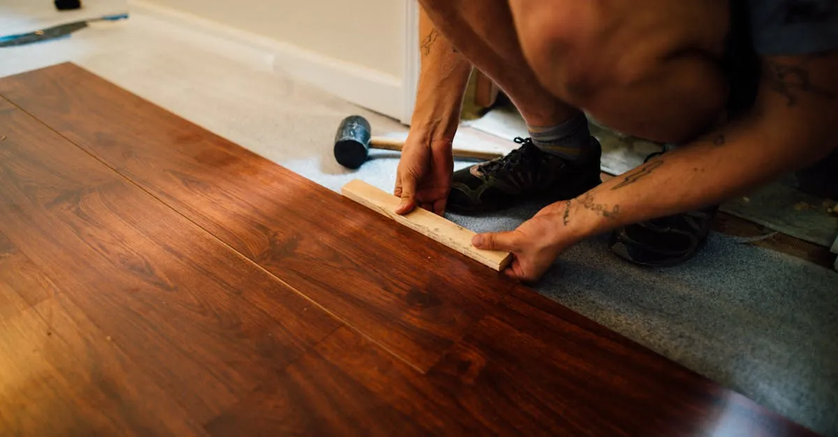 Professional installer laying floor material using proper installation technique