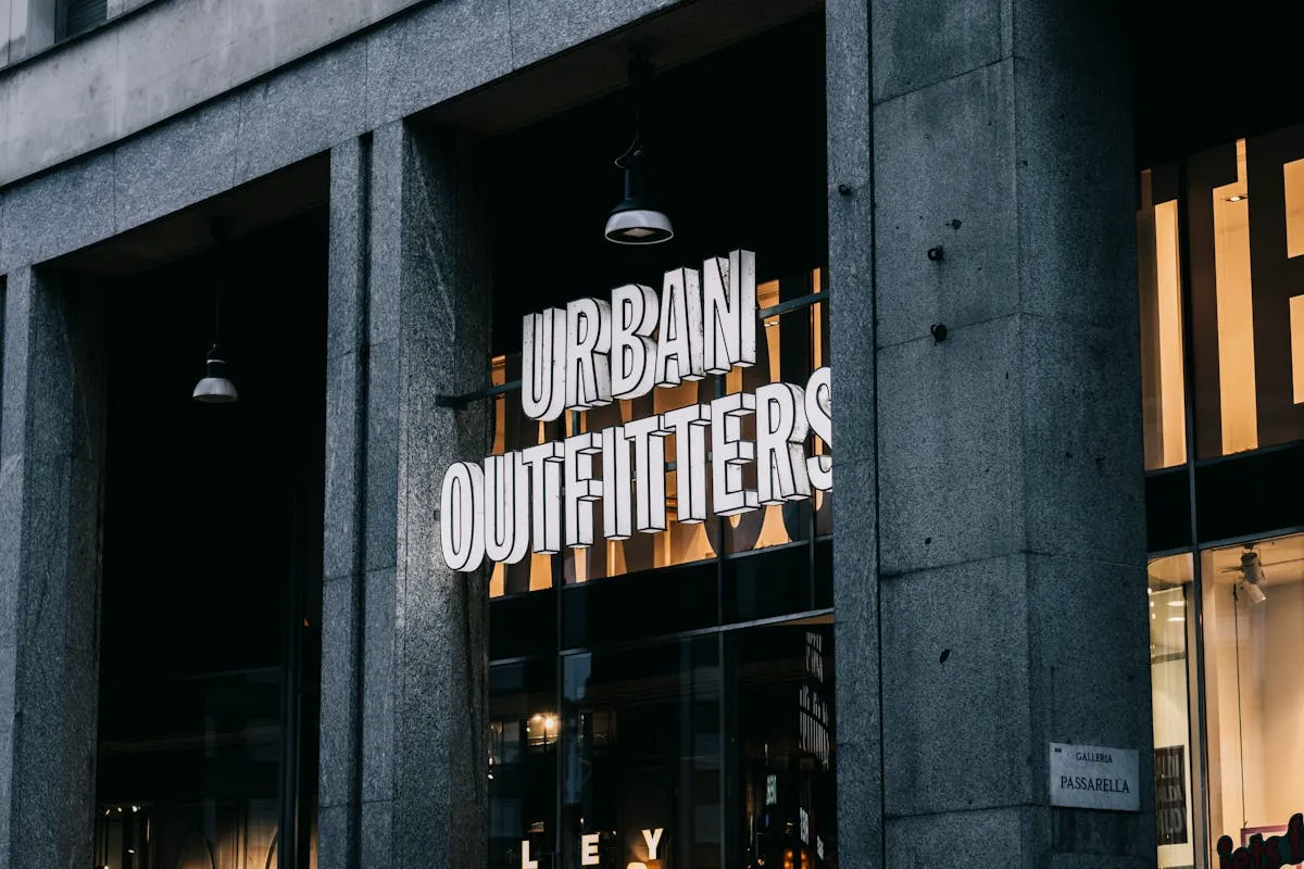Branded retail storefront exterior with professional window graphics and signage