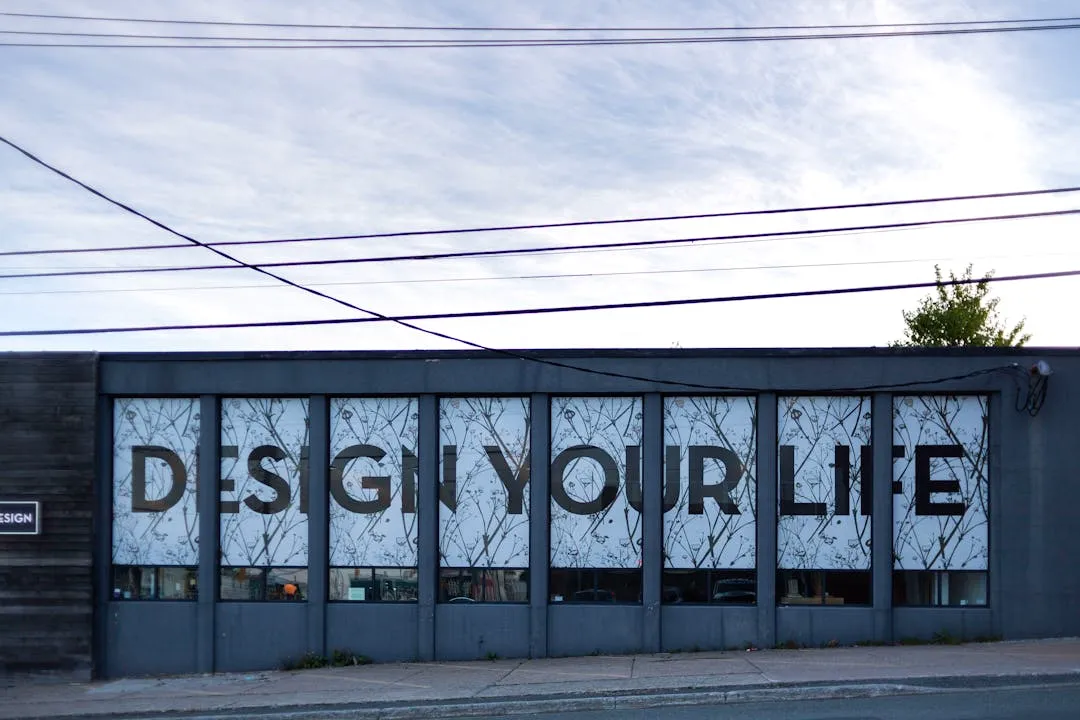 Professional storefront with certified vinyl window graphics installation